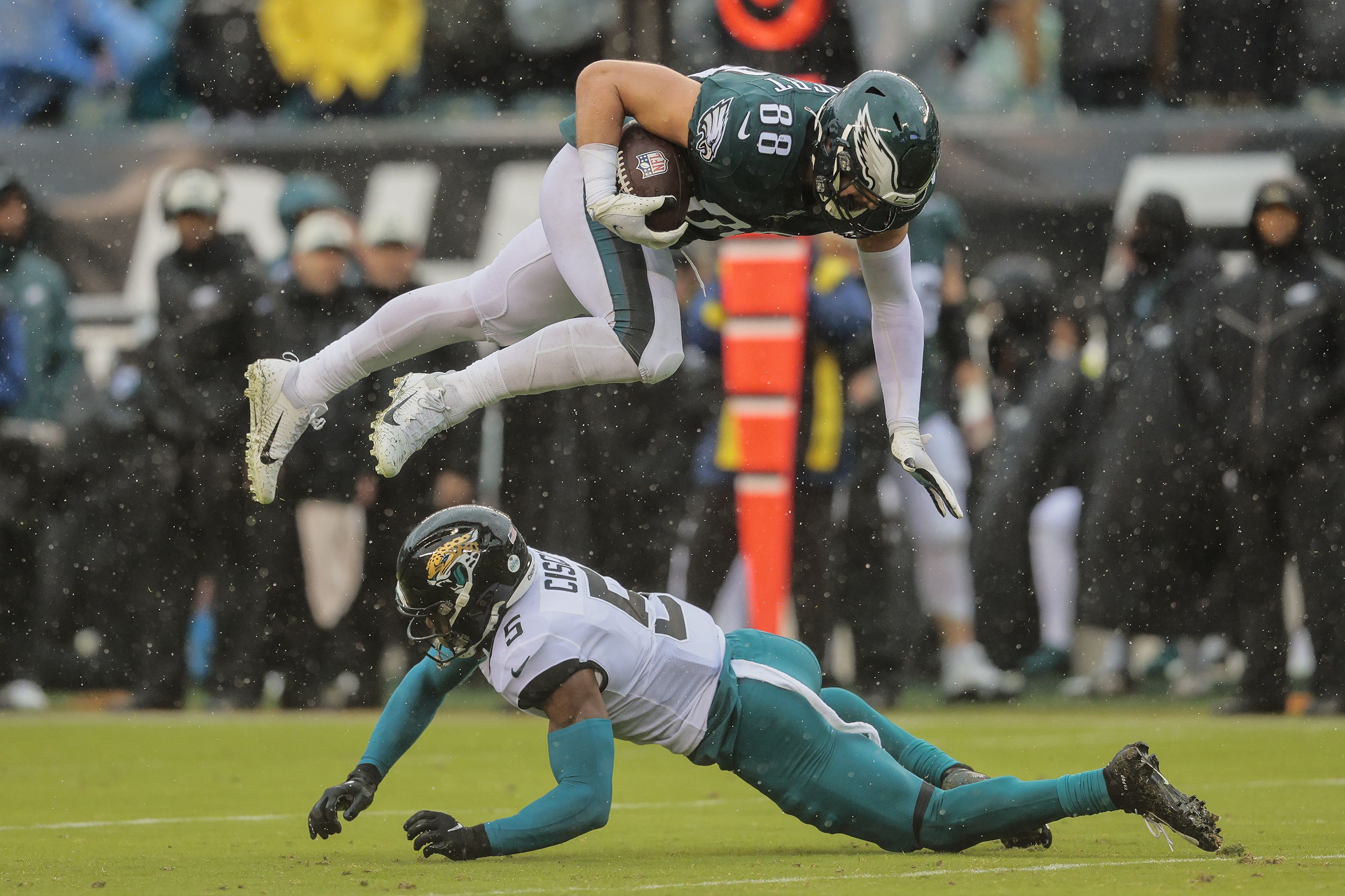 Eagles pound Jags on the ground in dreary conditions, rally from 14-0 hole  as Trevor Lawrence loses 4 fumbles