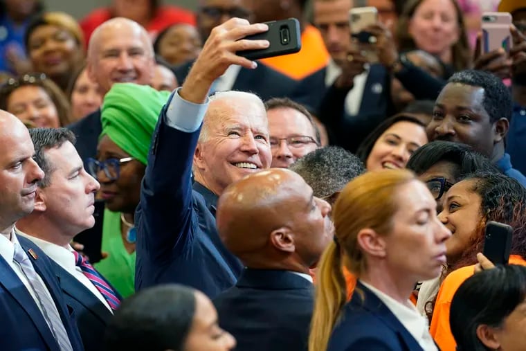 President Joe Biden greets members of the audience after speaking during a visit to a mobile COVID-19 vaccination unit in Raleigh, N.C., in June.