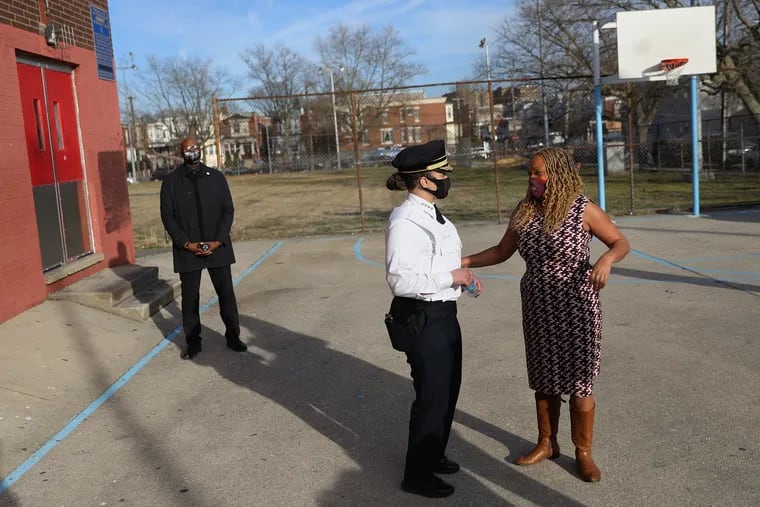 Philadelphia Police Commissioner Danielle Outlaw talks with 3rd District City Councilmember Jamie Gauthier (right) after a news conference about gun violence at Christy Recreation Center in West Philadelphia on March 12.