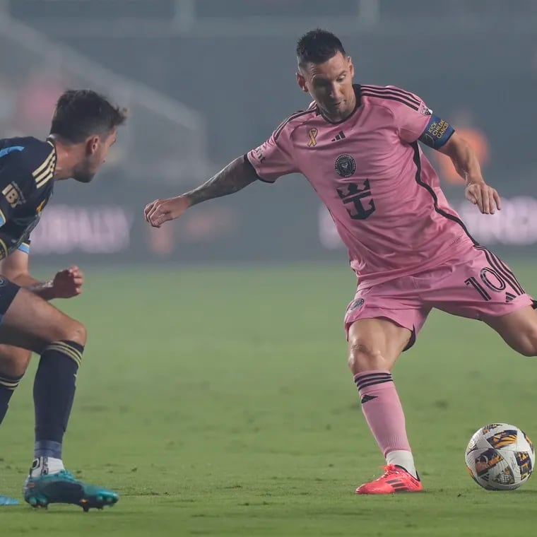 Inter Miami superstar Lionel Messi (right) on the ball in front of the Union's Leon Flach during the first half.