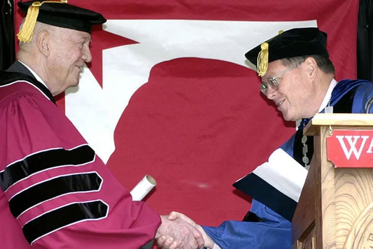 John Eisenhower (left), a president's son who built a career in letters, gets an honorary degree in 2005 at Washington College in Maryland. (AP)