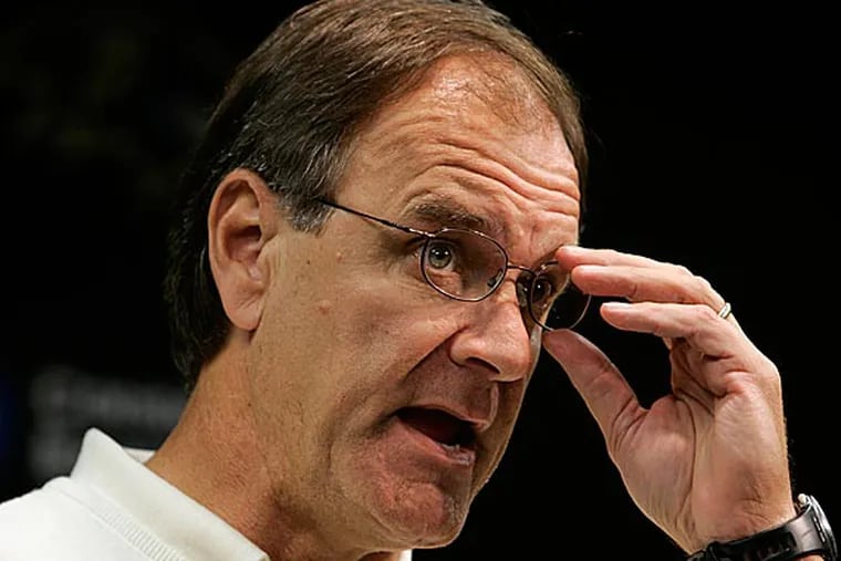 Baltimore Ravens head coach Brian Billick adjusts his glasses during a news conference in Owings Mills, Md., on Tuesday Oct. 17, 2006. Billick announced that he had fired offensive coordinator Jim Fassel and will now be calling the offensive plays himself. (AP Photo/Chris Gardner)