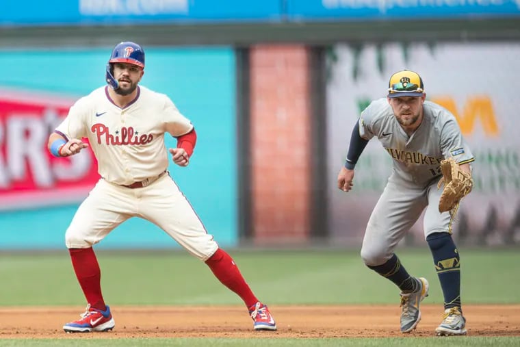 Kyle Schwarber and Rhys Hoskins shown during Wednesday's series finale between the Phillies and Brewers.