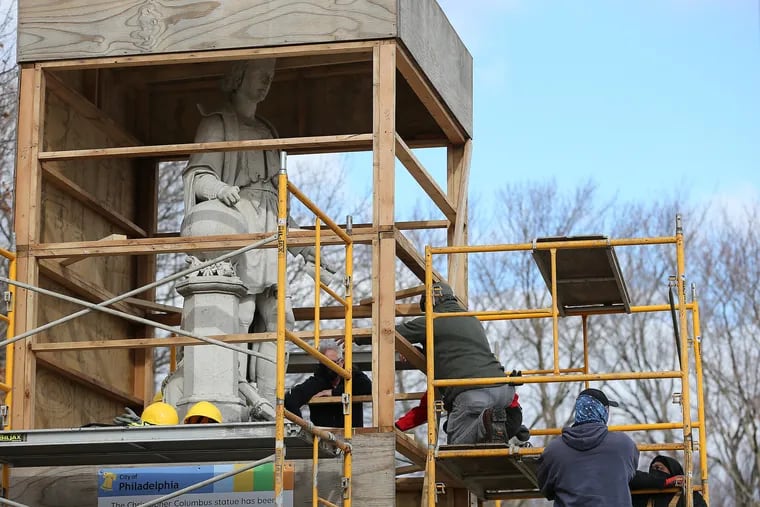 The Christopher Columbus statue in Marconi Plaza in South Philadelphia has been in a box since anti-racism protesters clashed with defenders of the explorer's legacy in 2020.