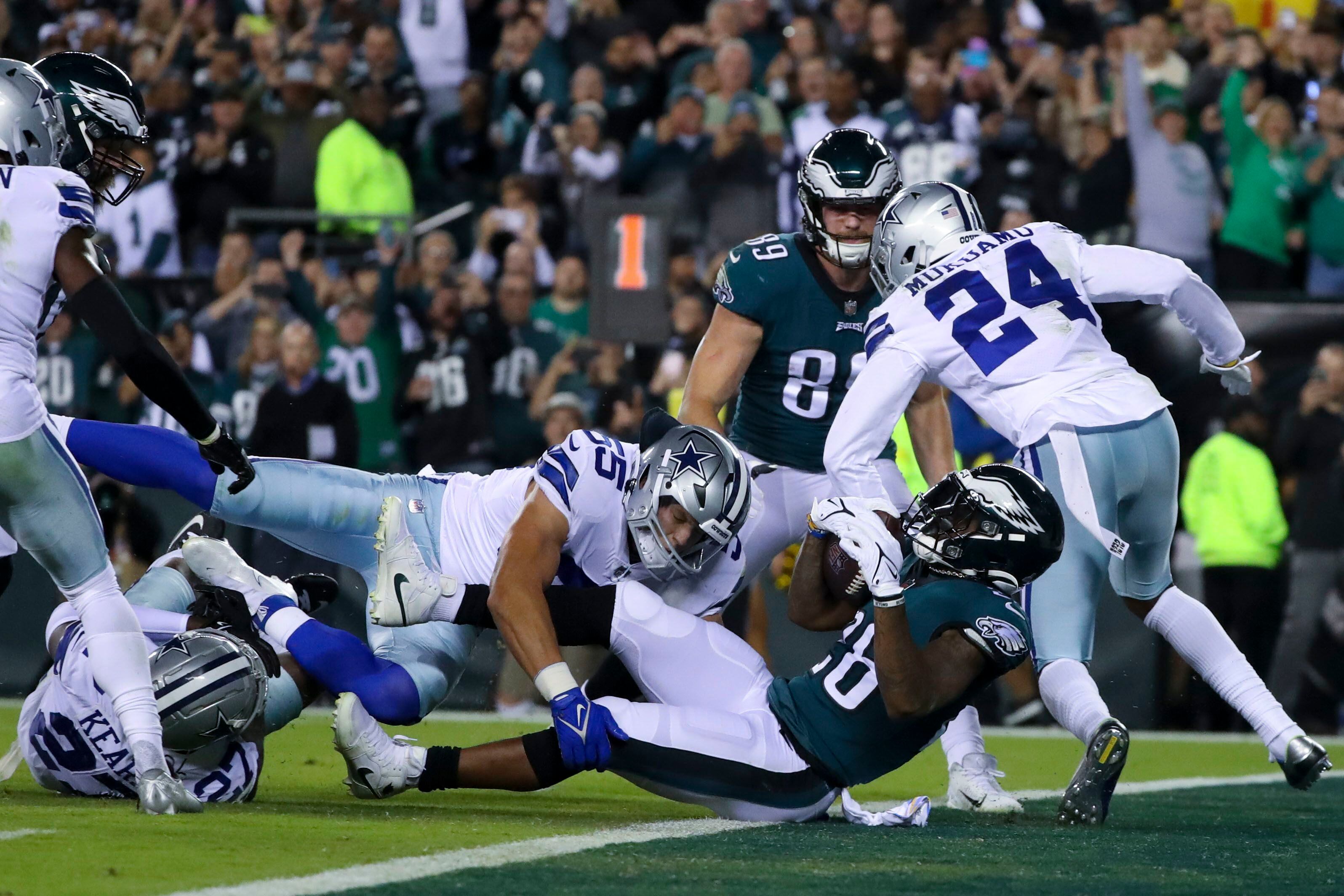 PHILADELPHIA, PA - OCTOBER 16: Dallas Cowboys Cornerback Trevon Diggs (7)  tackles Philadelphia Eagles Wide Receiver A.J. Brown (11) during the first  half of the National Football League game between the Dallas