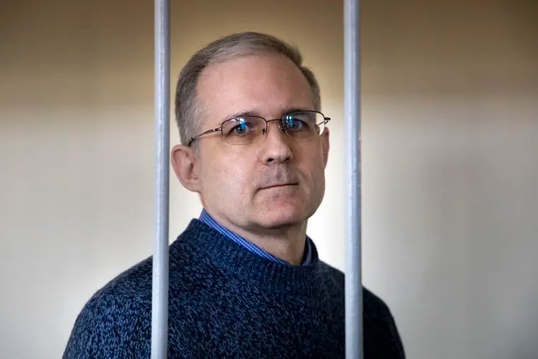 In this Aug. 23, 2019 photo, Paul Whelan speaks while standing in a cage as he waits for a hearing in a courtroom in Moscow.