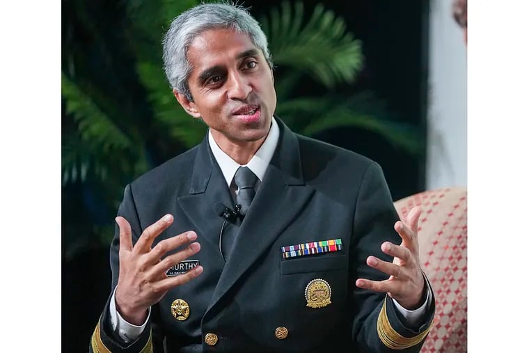 FILE - United States Surgeon General Dr. Vivek Murthy discusses the importance of social connection to our mental and physical well-being with Matthew McConaughey, obscured at right, Wednesday, Nov. 8, 2023, in Austin, Texas. The U.S. surgeon general has called on Congress to require warning labels on social media platforms similar to those now mandatory on cigarette boxes. In a Monday, June 17, 2024, opinion piece in the The New York Times, Dr. Vivek Murthy said that social media is a contributing factor in the mental health crisis among young people.(Ricardo B. Brazziell/Austin American-Statesman via AP, File)