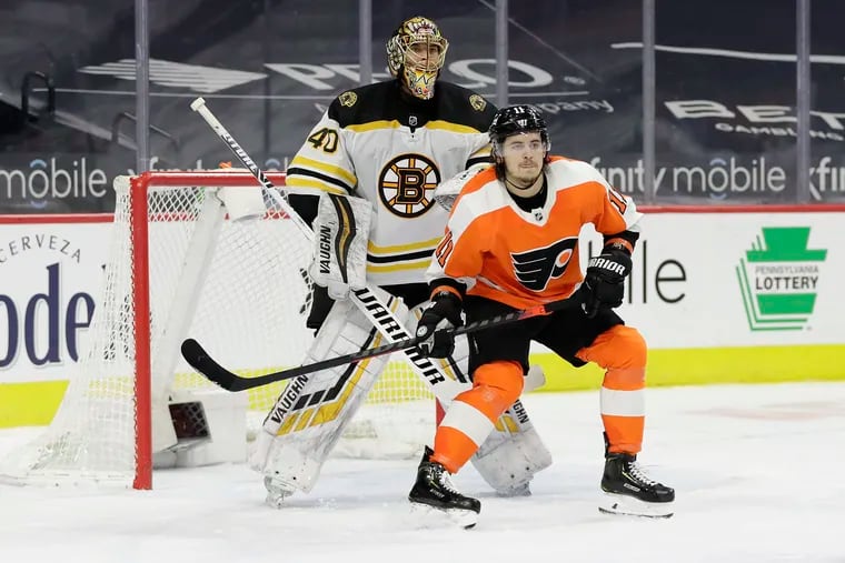 Flyers right winger Travis Konecny gets in position in front of Boston Bruins goaltender Tuukka Rask on Friday.