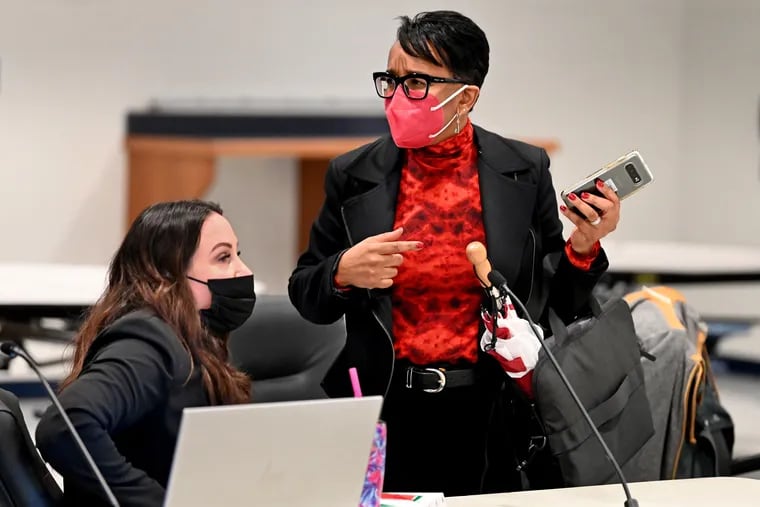 Northern Burlington County Regional School Board vice president Angela Reading (left) and member Kerri Tillett (right) talk following their meeting Feb. 22, 2022. Tillett was overwhelmingly elected to her seat but is now fighting to keep her position after three county residents signed a petition to recall her.