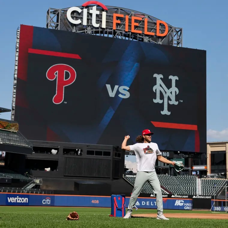 Phillies third base Alec Bohm throws during a workout at Citi Field.