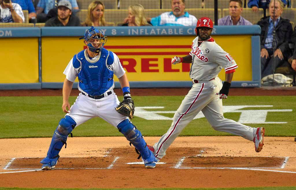 Cliff Lee, Carlos Ruiz dominant as Dodgers fall in opener to