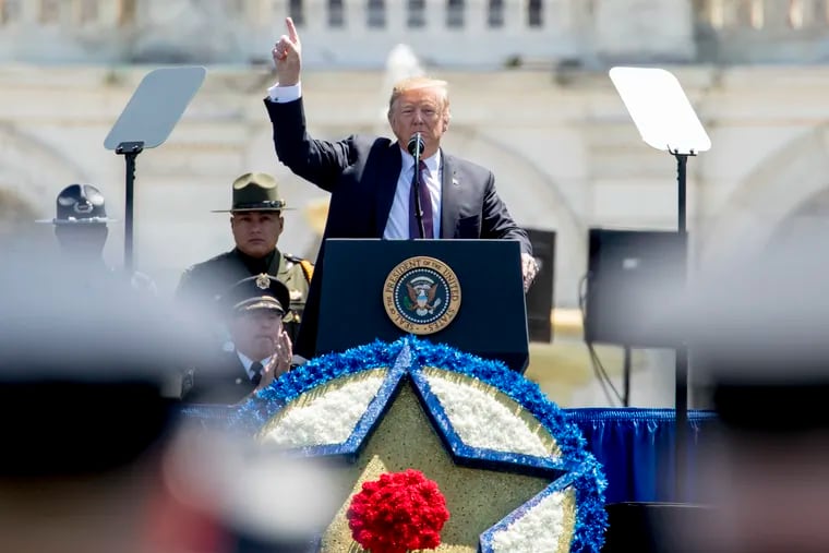 President Trump speaks at the 38th Annual National Peace Officers Memorial Service on the West Lawn of the Capitol Building on Wednesday. He criticized prosecutors in Philadelphia and Chicago as not going after dangerous criminals.