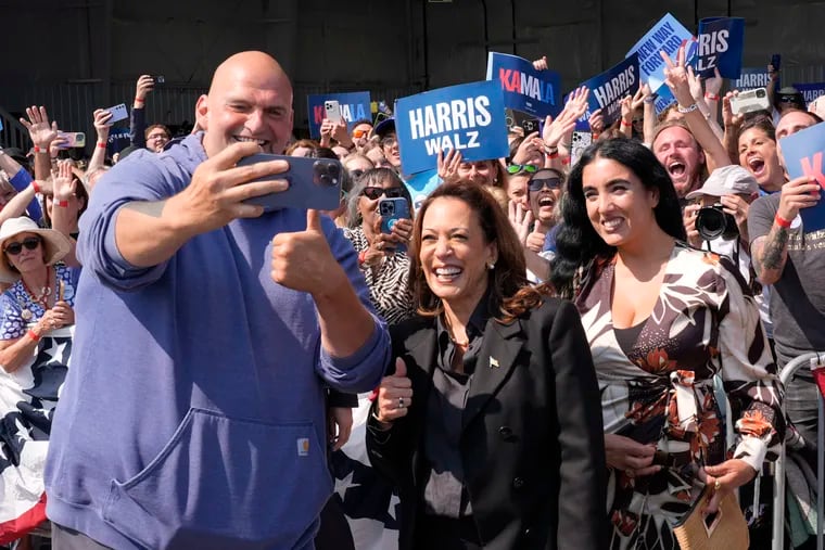 Democratic presidential nominee Vice President Kamala Harris takes a selfie with Sen. John Letterman, D-Pa., and his wife Gisele Barreto Fetterman, after Harris arrived at John Murtha Johnstown-Cambria Airport, in Johnstown, Pa., for a campaign event, Friday, Sept. 13, 2024. (AP Photo/Jacquelyn Martin)