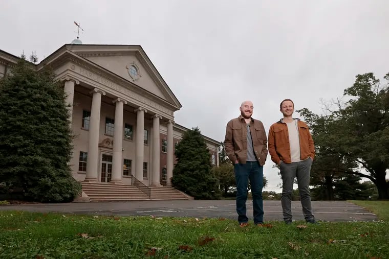 Velocity Venture Partners co-founders Zach Moore (left) and Tony Grelli outside the former Harleysville Mutual Insurance Co.