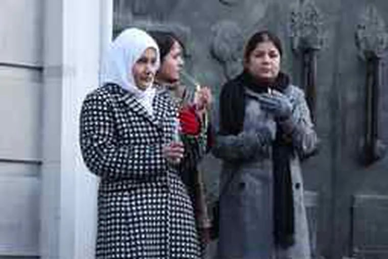 Relatives of Briton Akmal Shaikh conducting a vigil yesterday outside the Chinese Embassy in London.