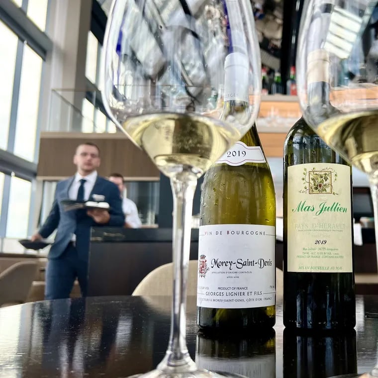 Bottles of wine are teed up as possibilities for the fifth-anniversary menu at Jean-Georges at the Four Seasons Hotel.