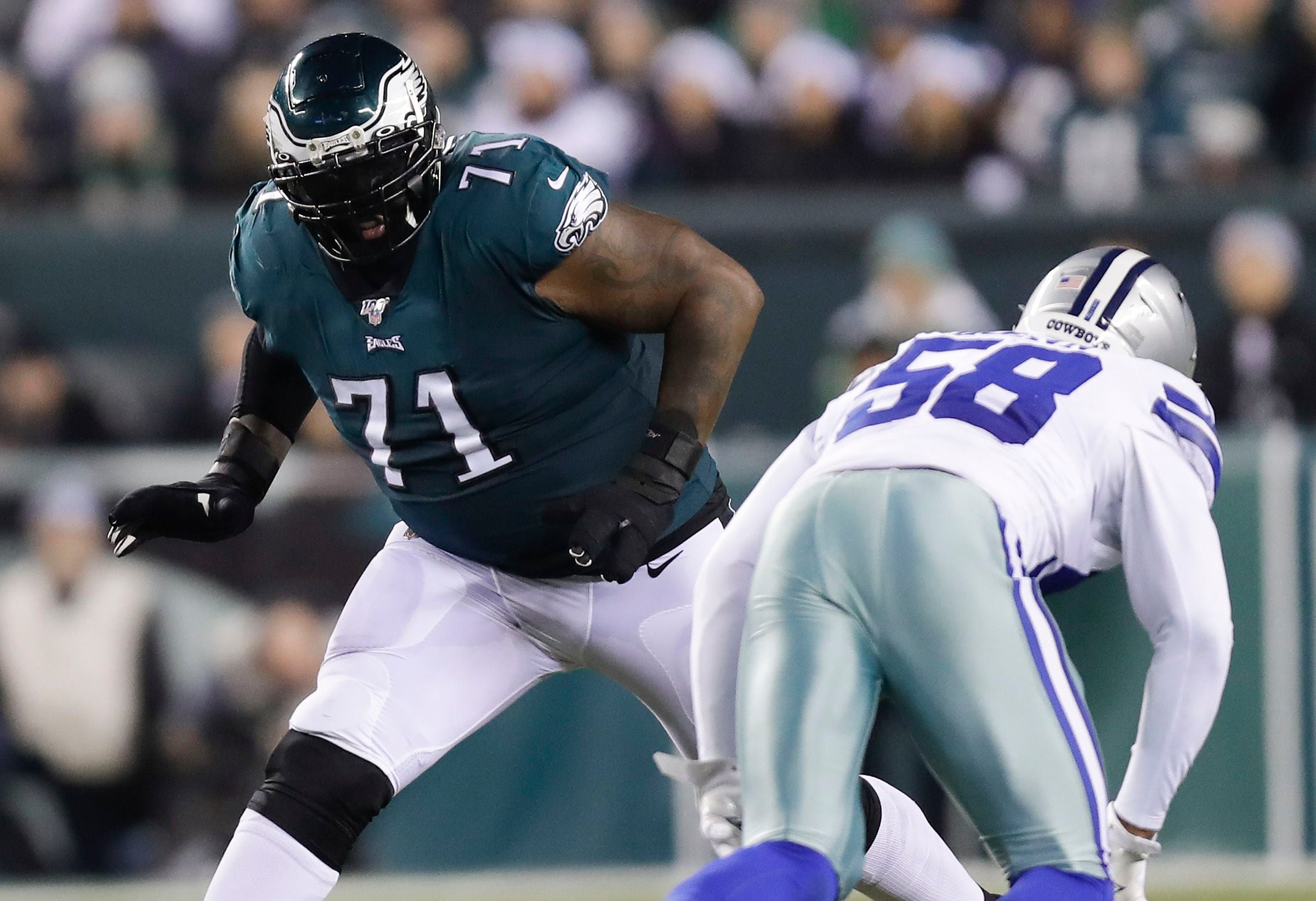 Lane Johnson carries Jason Peters' jersey out as Eagles take the