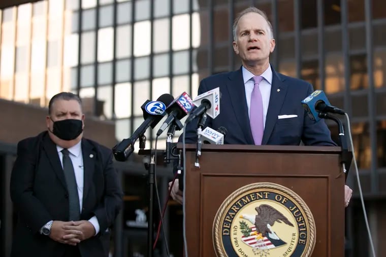 U.S. Attorney William M. McSwain speaks Thursday during a news conference announcing federal charges against the four men accused in the March shooting death of Philadelphia Police Cpl. James O’Connor IV. Standing next to McSwain is John McNesby, president of the Fraternal Order of Police.