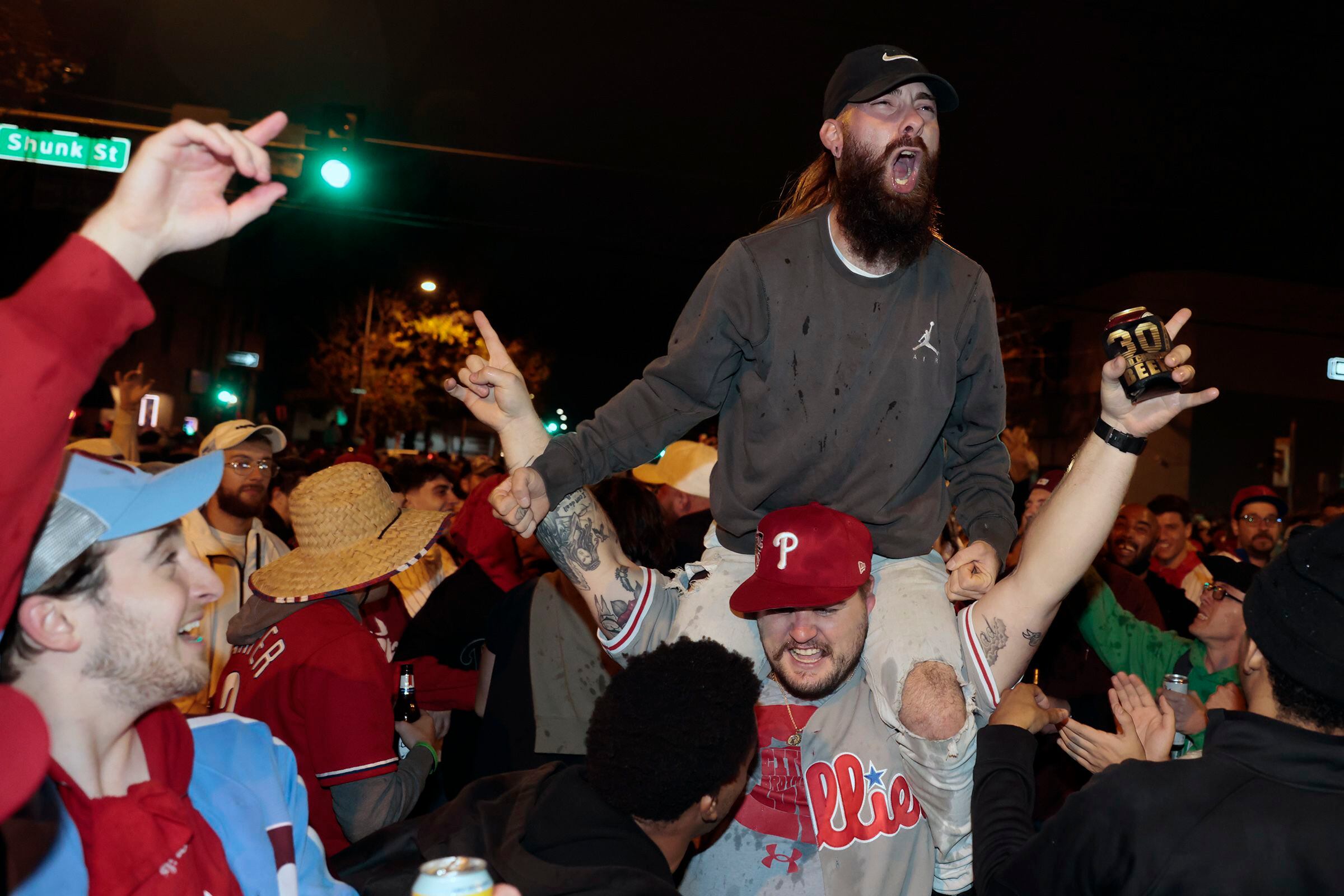 Phillies fans celebrate World Series berth climbing greased poles after  National League championship