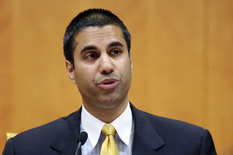 Federal Communications Commission Commissioner Ajit Pai speaks during an FCC meeting in Washington. The FCC has voted to end ‘net neutrality’ rules.