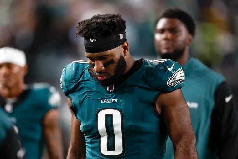 Eagles defensive end Bryce Huff walks off the field after the stunning loss to the Atlanta Falcons.