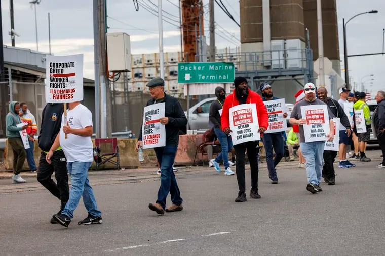 Members of the International Longshoremen’s Association strike at Packer Avenue Marine Terminal in South Philadelphia on Tuesday.