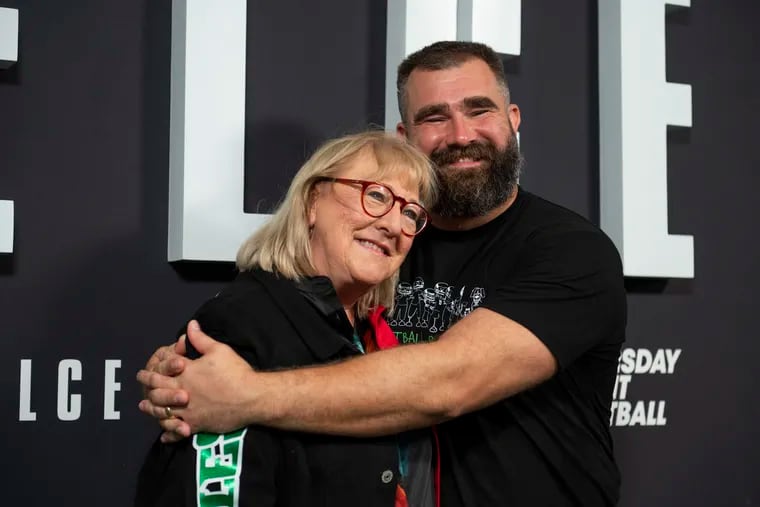Donna Kelce (left) and Jason Kelce (right) pose for a photo at the premier of Jason Kelce’s documentary at Suzanne Roberts Theater in Philadelphia on Friday, Sept. 9, 2023. The film, Kelce, is a feature-length documentary featuring Jason Kelce and the Eagles’ 2022-2023 season.