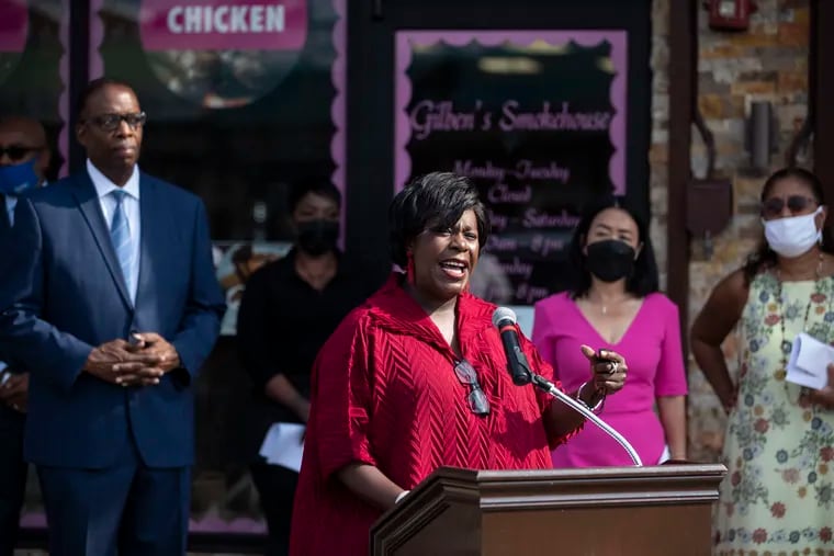 Cherelle Parker, then a Council member, speaks during a news conference outside of Gilben's Bakery and Specialty Sandwich Shop in East Mount Airy in 2021. Council members announced a funding plan for a $400 million neighborhood preservation initiative.