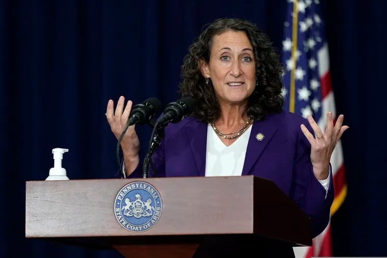 FILE - In this Thursday, Nov. 5, 2020, file photo, Pennsylvania Secretary of State Kathy Boockvar speaks during a news conference about counting votes from Tuesday's election, in Harrisburg, Pa. After navigating the sea of challenges in 2020, Boockvar is leaving her job in Democratic Gov. Tom Wolf's cabinet under a cloud that has nothing to do with last year's election.