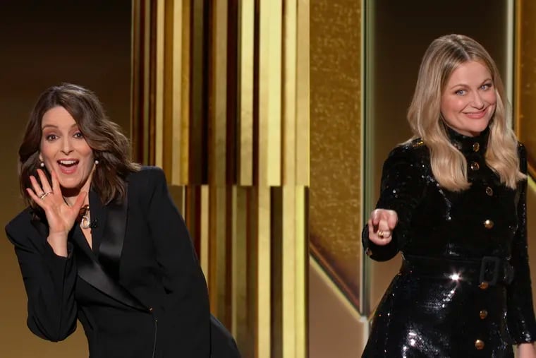 In this video grab issued Sunday by NBC, hosts Tina Fey (left) from New York, and Amy Poehler, from Beverly Hills, Calif., speak at the Golden Globe Awards.