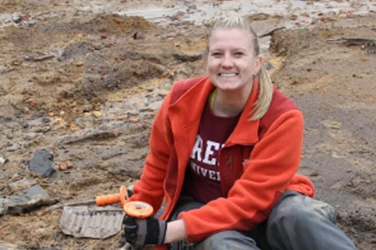 This is Alison Moyer, lead author of a study that challenges previous research on the color of dinosaur feathers. In this photo, Moyer is depicted on a fossil dig in Alabama. No credit necessary.