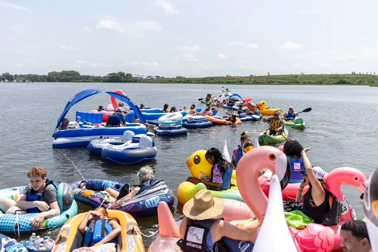 People out in the Delaware River enjoying the 5th annual Floatopia with Upstream Alliance at Pyne Poynt Park in Camden, N.J., on Saturday.