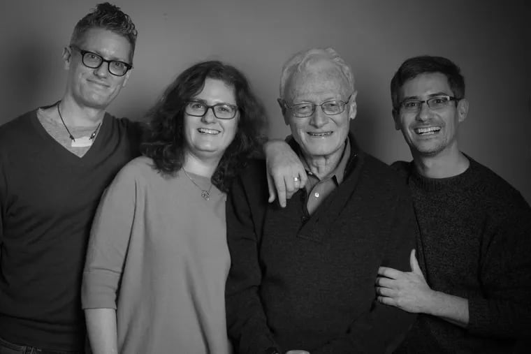 Dr. Nathanson (second from right) smiles with his children, from left, son John, daughter Kate, and son Daniel.