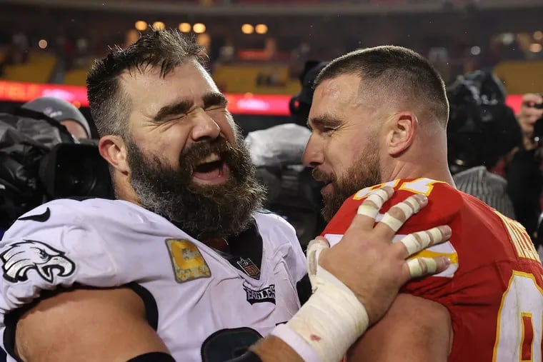 Philadelphia Eagles center Jason Kelce (left) shares a laugh with his brother Kansas City Chiefs tight end Travis Kelce after the Eagles win 21-17 over the Chiefs at Arrowhead Stadium in Kansas City, Mo. on Monday, Nov. 20, 2023.