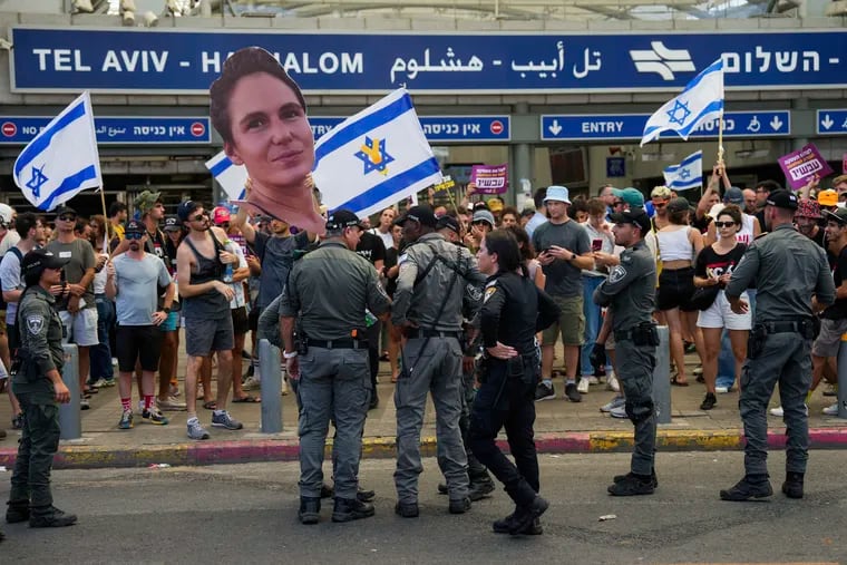 Demonstrators demand a cease-fire deal and the immediate release of hostages held by Hamas in the Gaza Strip after the deaths of six hostages in the Palestinian territory, in Tel Aviv, Israel.