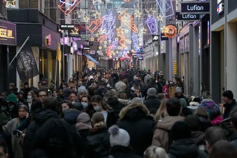 A crowd of shoppers on a street in Amsterdam on Saturday.