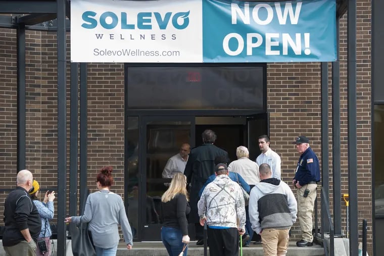 Customers lined up in February to purchase medical marijuana outside Solevo Wellness in Squirrel Hill, Pa.