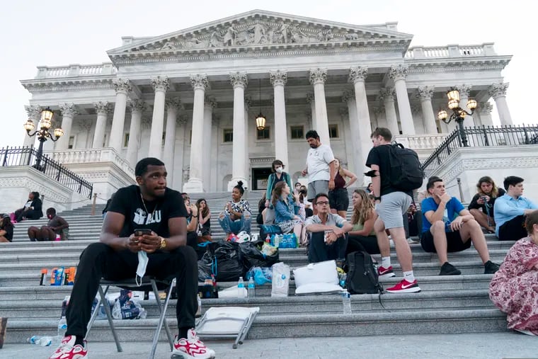 Supporters of Rep. Cori Bush (D., Mo.) camped with her outside the U.S. Capitol on Monday to protest the end of a nationwide eviction moratorium.