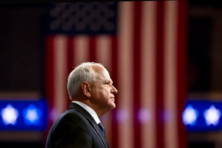 Minnesota Gov. Tim Walz speaks at a campaign event with running mate Vice President Kamala Harris, the Democratic presidential nominee, at Temple University's Liacouras Center on Aug. 6, 2024.