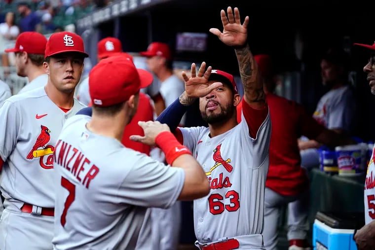 St. Louis Cardinals shortstop Edmundo Sosa (63) and catcher Andrew Knizner in the dugout before a game against the Braves on July 5.