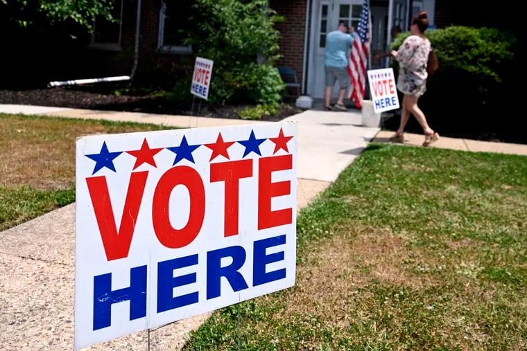 Valerie and Frank Fullerton enter their polling place at the Carman Tilelli Community Center in Cherry Hill on primary election day Tuesday June  4, 2024. When leaving they said they cast their ballots for former President Donald J. Trump.