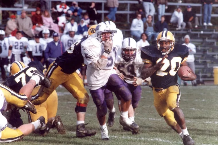 Stan Drayton runs the ball as a member of the Allegheny football team. He would later coach there before going on to win the Temple job.