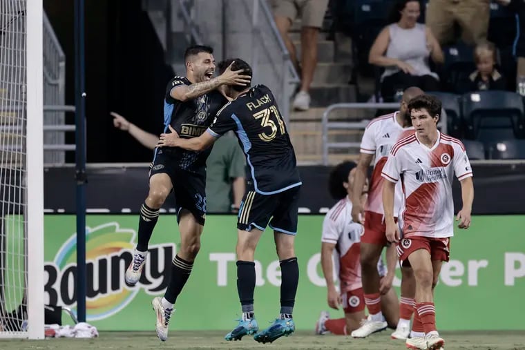 Union’s Tai Baribo (left) finished with a hat trick in Wednesday night's win over New England.