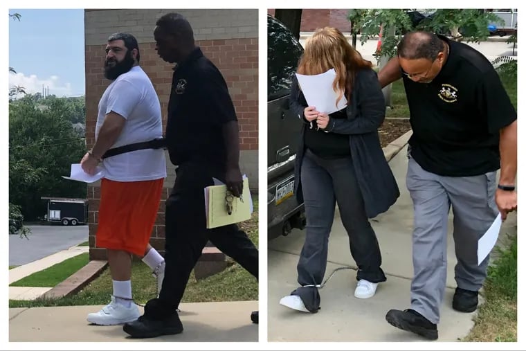 Mousa Hawa (left) and Holly Back are escorted out of a district court in Coatesville after their preliminary hearing Friday. Hawa and Back are charged with third-degree murder after, prosecutors say, their 8-year-old son, Hunter, overdosed on fentanyl.