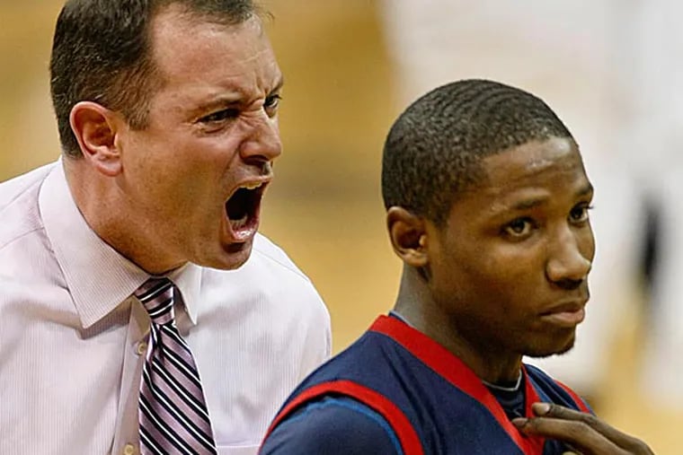 A Robert Morris internal investigation into former basketball coach Mike Rice found no evidence of the "coaches against player" brawls alleged by an ex-Rutgers employee. (Keith Srakocic/AP)