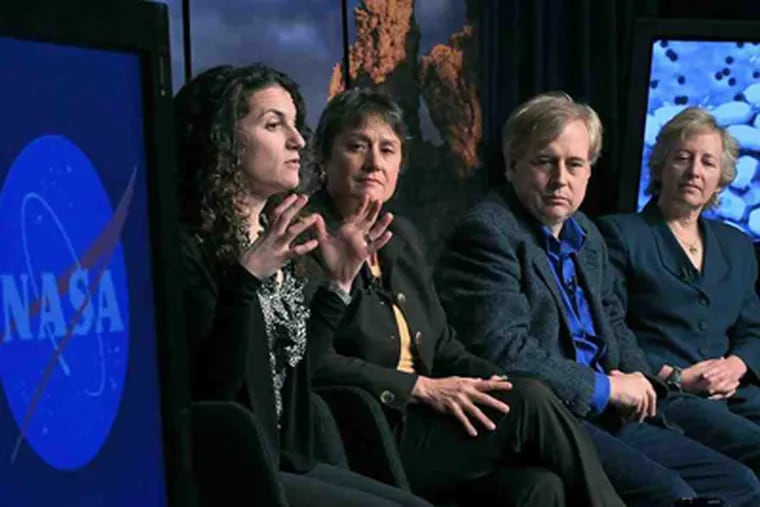 NASA fellow Felisa Wolfe-Simon announcing the arsenic finding Thursday in Washington; from left are colleagues Mary Voytek, Steven Benner, Pamela Conrad.