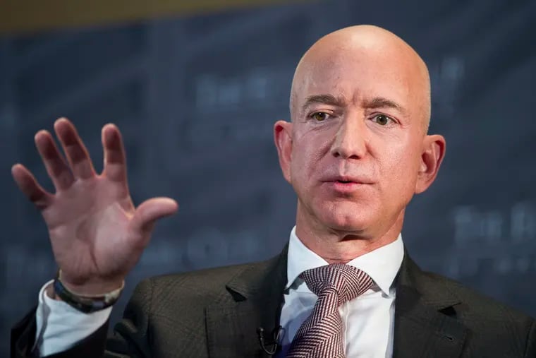 FILE- In this Sept. 13, 2018, file photo Jeff Bezos, Amazon founder and CEO, speaks at the Economic Club of Washington's Milestone Celebration in Washington.