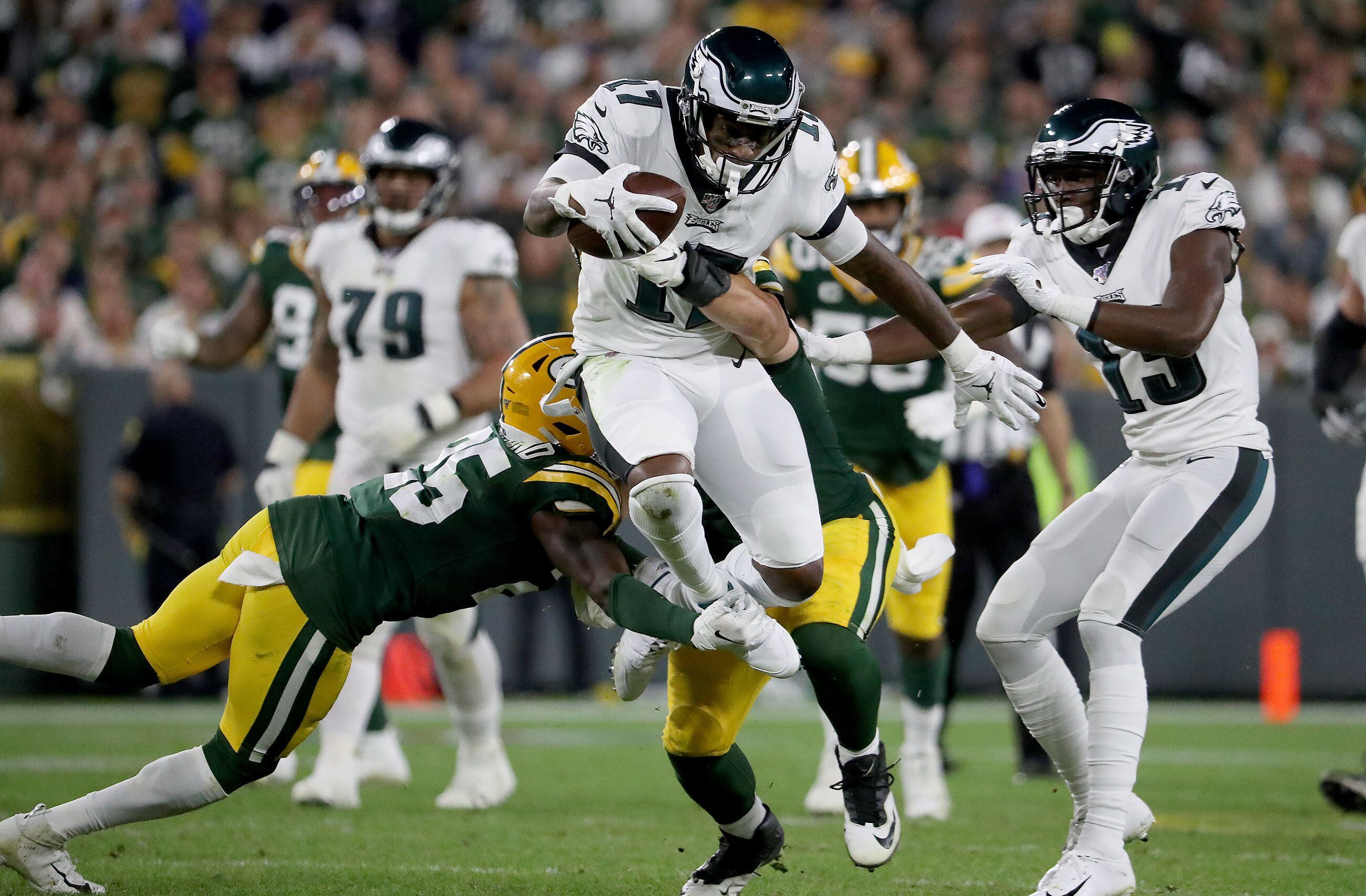 Philadelphia Eagles running back Jordan Howard (24) runs the ball against  the Green Bay Packers during an NFL football game, Thursday, Sept. 26,  2019, in Green Bay, Wis. The Eagles defeated the