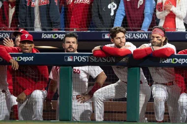 The Phillies look on from the dugout late in their loss to the Diamondbacks in Game 7 of the NLCS last season.