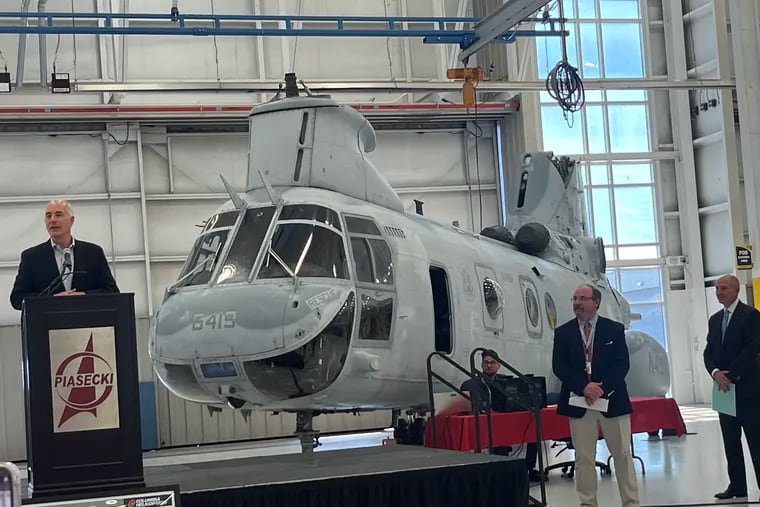 U.S. Sen. Bob Casey (left), with John W. Piasecki (center), CEO of Piasecki Aircraft Corp., and David Balevic, CEO of Oregon-based Columbia Helicopters, at Piasecki's "Heliplex" in Sadsbury Township near Coatesville. The two company leaders detailed their plans to rebuild Vietnam-era military helicopters for modern military and civilian use.